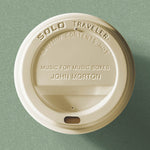 the album cover for John Morton - Solo Traveler Music for Music Boxes