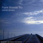 the album cover for Frank Woeste Trio - Untold Stories