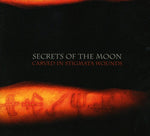 the album cover for Secrets Of The Moon - Carved in Stigmata Wounds