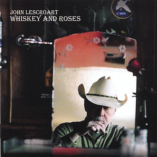 the album cover for John Lescroart - Whiskey and Roses