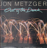the album cover for Jon Metzger Quartet - Out of the Dark