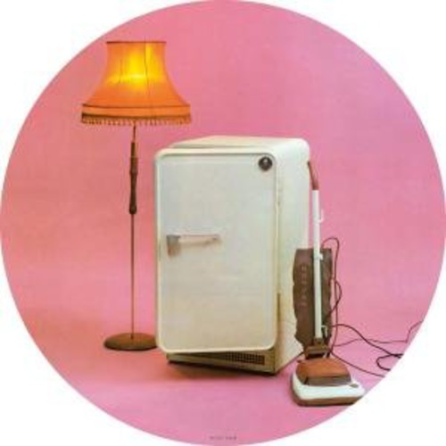 the album cover for The Cure - Three Imaginary Boys