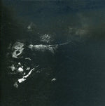 the album cover for October Falls - The Womb Of Primordial Nature