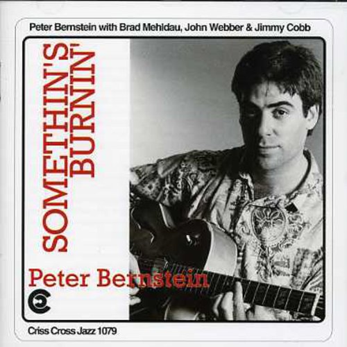 the album cover for Peter Bernstein - Something's Burnin