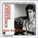 the album cover for Peter Bernstein - Something's Burnin