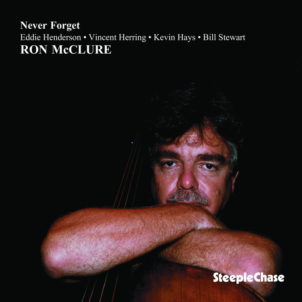the album cover for Ron Mcclure - Never Forget