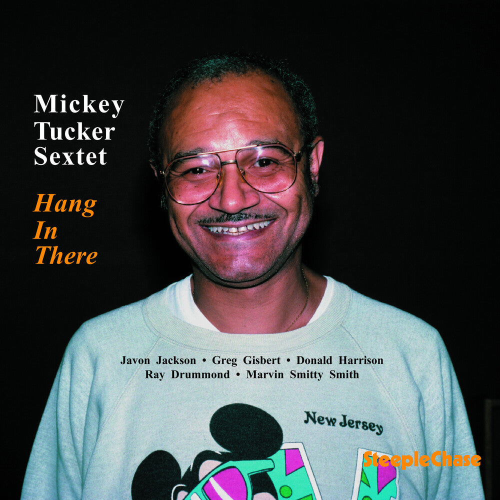 the album cover for Mickey Tucker - Hang in There