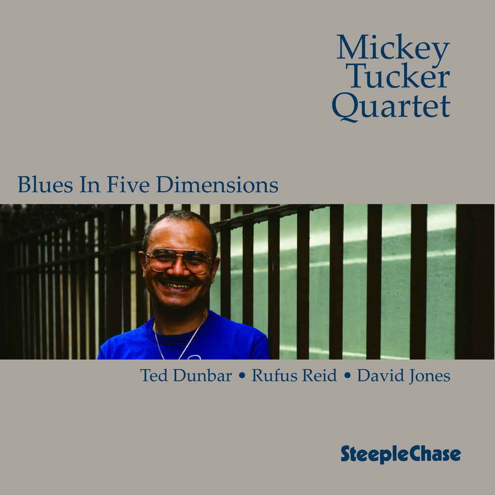 the album cover for Mickey Tucker - Blues In Five Dimensions