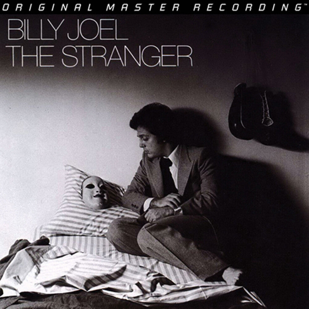 the album cover for Billy Joel - Stranger