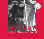 the album cover for Klaus Stoll - Mozart in Der Bauernmusik