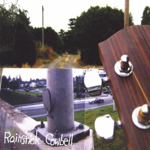 the album cover for Rainstick Cowbell - Self Assemble