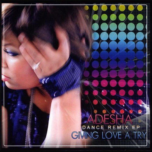 the album cover for Adesha - Giving Love a Try (Dance Remix EP)