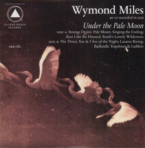 the album cover for Wymond Miles - Under the Pale Moon