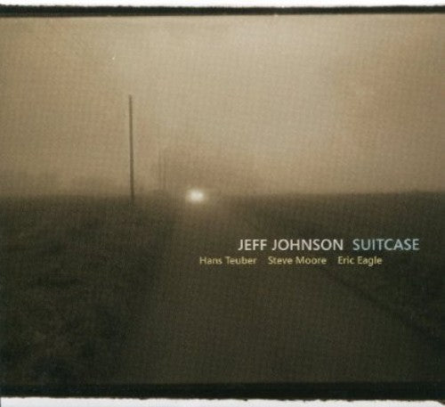 the album cover for JOHNSON/DUNNING - Suitcase