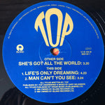 Top : She's Got All The World (12")