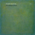 the album cover for Giovanni Guidi - City of Broken Dreams
