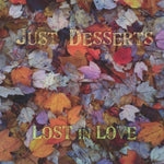 the album cover for Just Desserts - Lost In Love