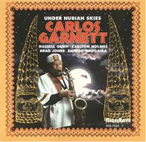 the album cover for Carlos Garnett - Under Nubian Skies