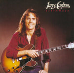 the album cover for Larry Carlton - Sleepwalk