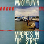 the album cover for Junior Murvin - Muggers in the Street
