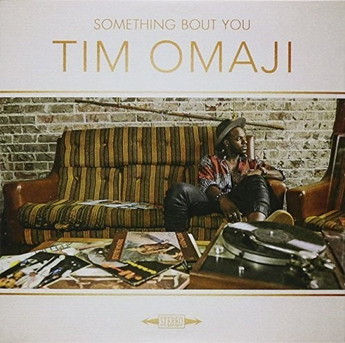 the album cover for Tim Omaji - Something Bout You