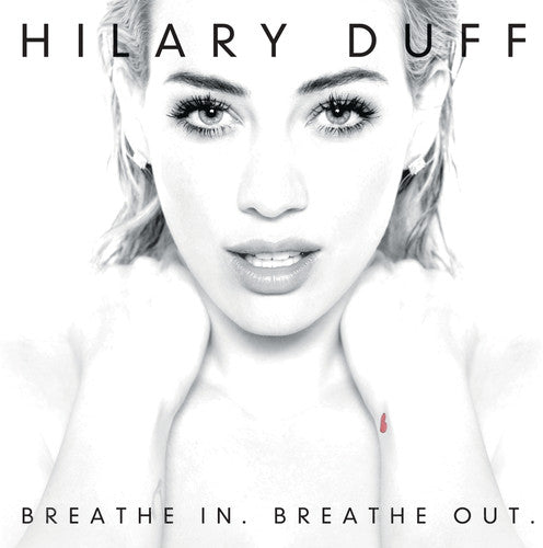 the album cover for Hilary Duff - Breathe In, Breathe Out