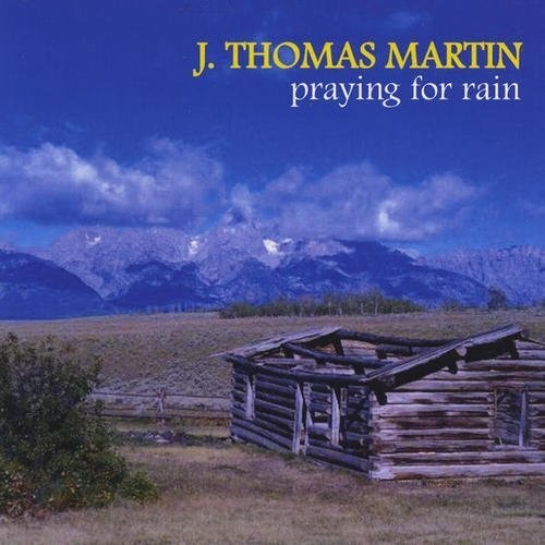 the album cover for Thomas Martin J - Praying for Rain