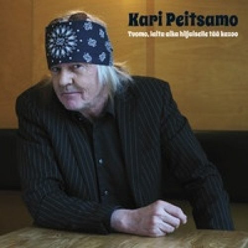 the album cover for Kari Peitsamo - Tuomo Laita Aika Hiljaiselle Taa K