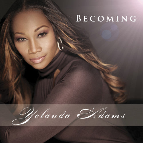 the album cover for Yolanda Adams - Becoming