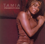 the album cover for Tamia - Stranger in My House (X9)
