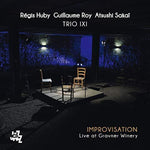 the album cover for Trio Ixi / Huby Regis / Guillaume,Roy / Atsushi - Improvisation: Live At Gravner Winery