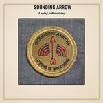 the album cover for Sounding Arrow - Loving Is Breathing