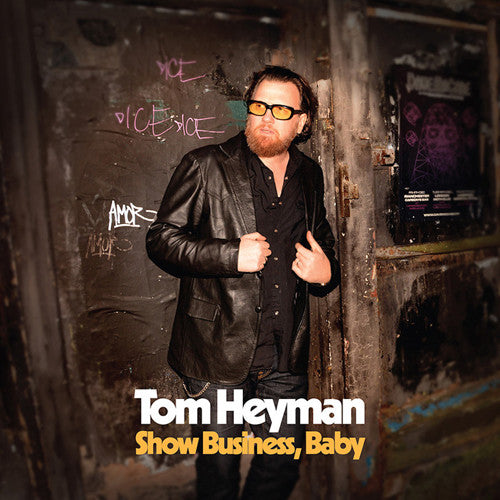 the album cover for Tom Heyman - Show Business Baby