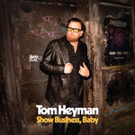 the album cover for Tom Heyman - Show Business Baby