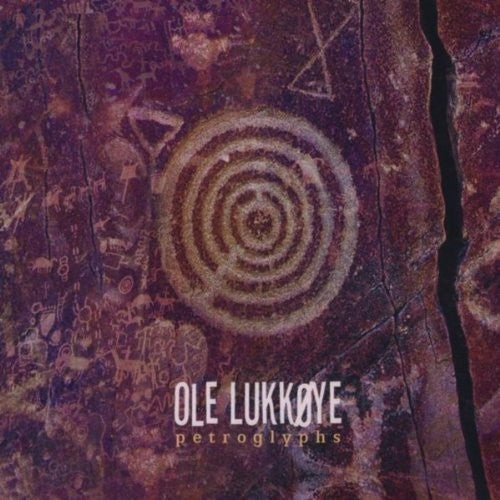 the album cover for Ole Lukkoye - Petroglyphs
