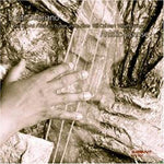 the album cover for Santi Debriano - Artistic License