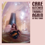 the album cover for Cakekitchen - Trouble Again In This Town
