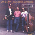 the album cover for Larry Schneider / Nussbaum,Adam / Richmond,Mike - On The Edge