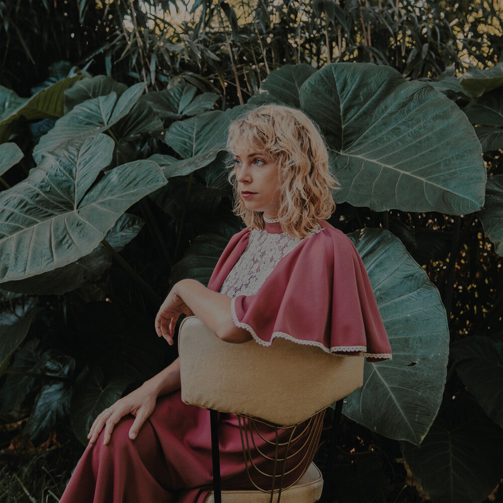 the album cover for K Jones .C. - Queen Of The In Between