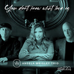 the album cover for Angela Wrigley Trio - You Don't Know What Love Is