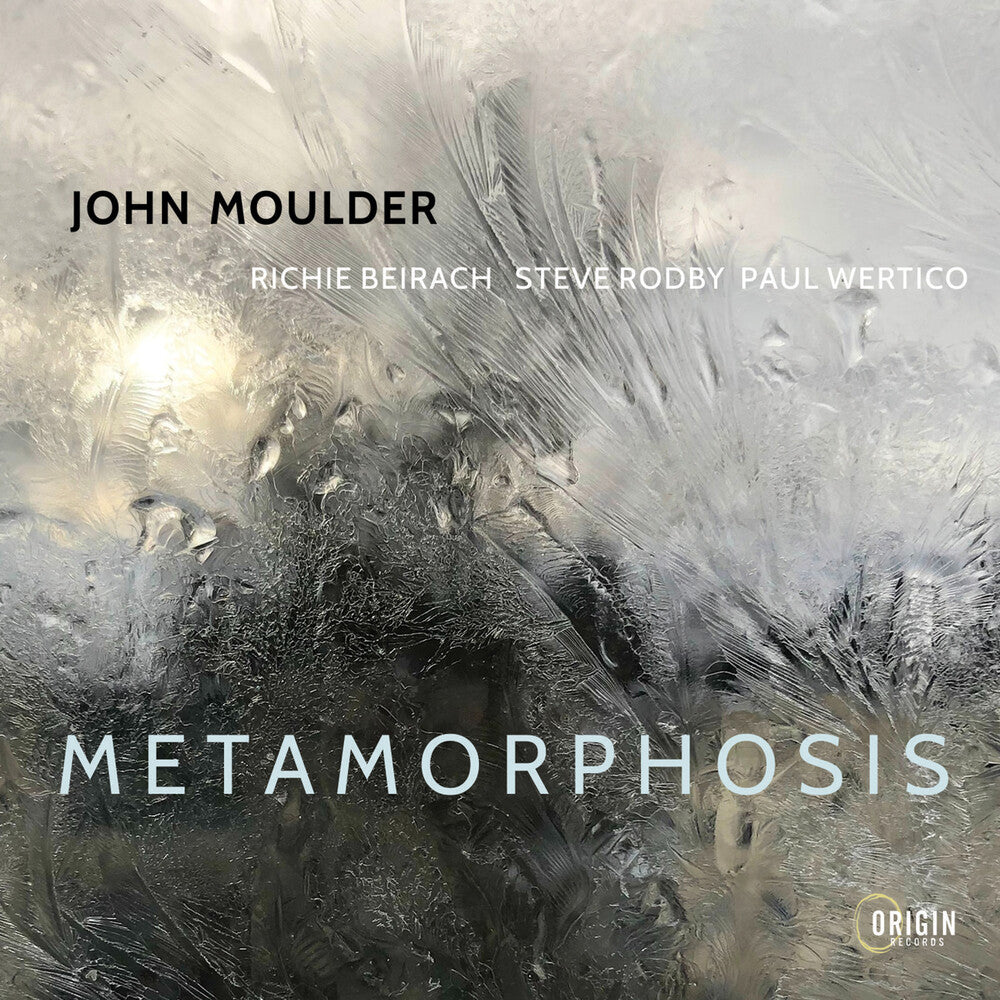 the album cover for John Moulder - Metamorphosis
