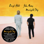 the album cover for Daryl Hall & John Oates - Marigold Sky: 25th Anniversary