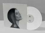 the album cover for Laura Pausini - Scatola / Caja (Ltd White Vinyl 12-inch, Sequential Number, Vinyl Cardboard Pre-cut Shape + UV Finishing on Shape)