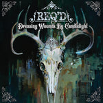 the album cover for REQ'D - Dressing Wounds By Candlelight