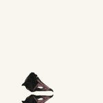 the album cover for Coil - New Backwards