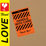 the album cover for Love Fiend - Handle With Care