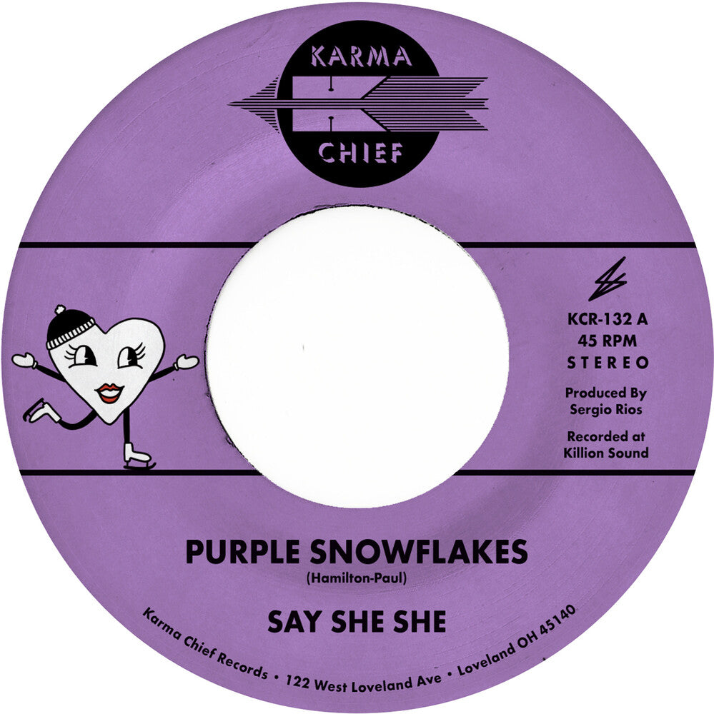 the album cover for Say She She - Purple Snowflakes / This Wintertime