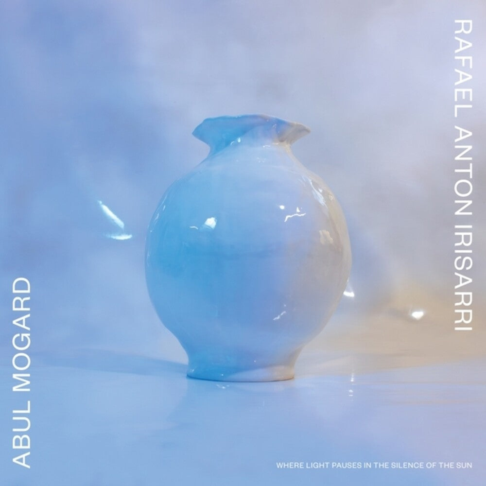 the album cover for Abul Mogard/ Rafael Anton Irisarri - Where Light Pauses In The Silence Of The Sun