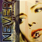 Kim Wilde : Never Trust A Stranger (12", Single)