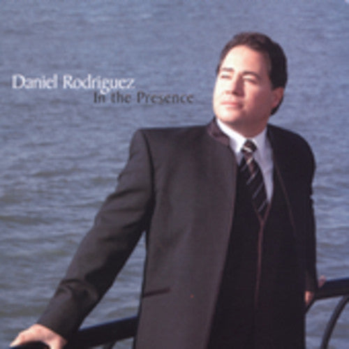 the album cover for Daniel Rodriguez - In the Presence